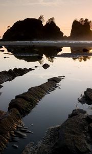 Preview wallpaper stones, water, clouds, sky, sun, horizon