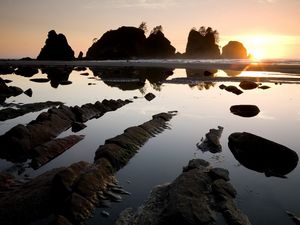 Preview wallpaper stones, water, clouds, sky, sun, horizon