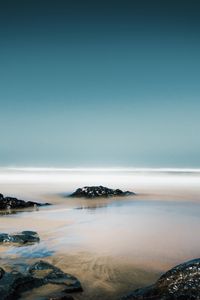 Preview wallpaper stones, water, fog, coast, horizon