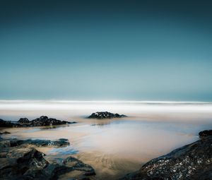 Preview wallpaper stones, water, fog, coast, horizon