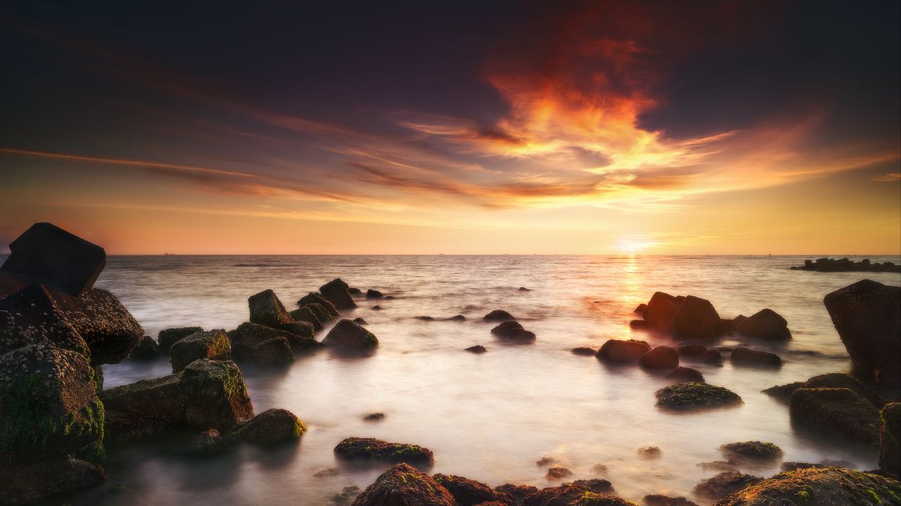 Wallpaper stones, water, horizon, sunset