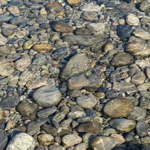 Preview wallpaper stones, water, ripples, transparent