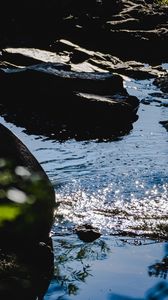 Preview wallpaper stones, water, river, ripples, glare