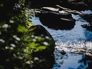 Preview wallpaper stones, water, river, ripples, glare