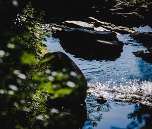 Preview wallpaper stones, water, river, ripples, glare