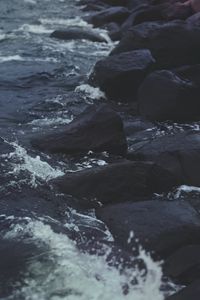 Preview wallpaper stones, water, sea, rocks, dark