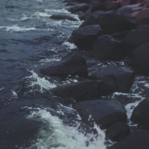 Preview wallpaper stones, water, sea, rocks, dark