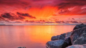 Preview wallpaper stones, water, sunset, horizon, sky