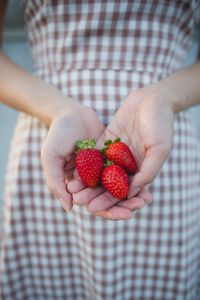 Preview wallpaper strawberries, berries, hands, girl