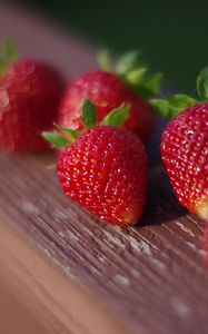 Preview wallpaper strawberries, berries, surface, wood