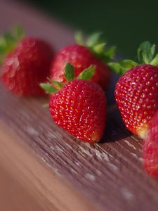 Preview wallpaper strawberries, berries, surface, wood