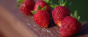 Preview wallpaper strawberries, berries, surface, wood