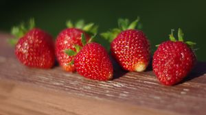 Preview wallpaper strawberries, berries, surface, macro