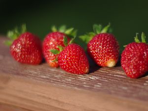 Preview wallpaper strawberries, berries, surface, macro