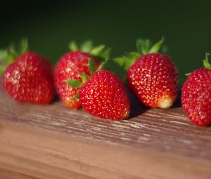 Preview wallpaper strawberries, berries, surface, macro