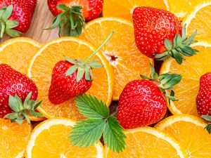 Preview wallpaper strawberries, orange, fruits, berry, slices