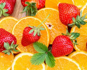 Preview wallpaper strawberries, orange, fruits, berry, slices