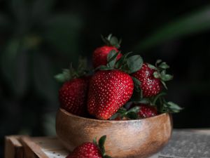 Preview wallpaper strawberry, berry, fruit, dish, newspaper