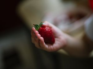 Preview wallpaper strawberry, berry, ripe, hand