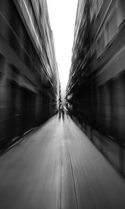 Preview wallpaper street, blur, bw, movement, buildings, perspective