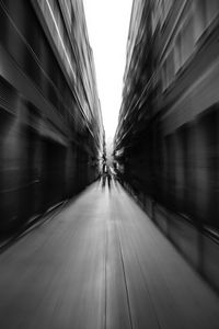 Preview wallpaper street, blur, bw, movement, buildings, perspective