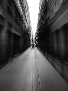 Preview wallpaper street, blur, bw, movement, buildings, perspective