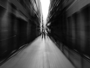 Preview wallpaper street, blur, bw, movement, buildings, perspective