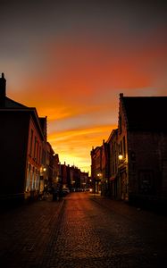 Preview wallpaper street, buildings, city, paving, lanterns, twilight