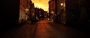 Preview wallpaper street, buildings, city, paving, lanterns, twilight