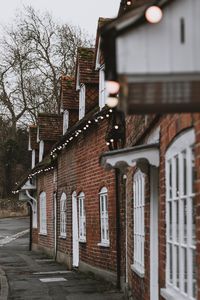 Preview wallpaper street, buildings, garlands, architecture, old, town