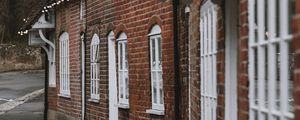 Preview wallpaper street, buildings, garlands, architecture, old, town