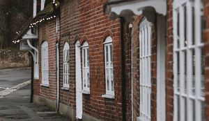 Preview wallpaper street, buildings, garlands, architecture, old, town