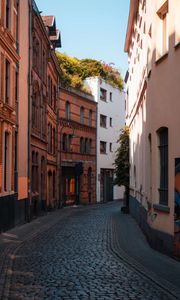 Preview wallpaper street, buildings, paving stones, architecture, flashlight
