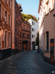 Preview wallpaper street, buildings, paving stones, architecture, flashlight