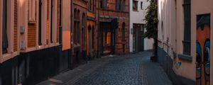 Preview wallpaper street, buildings, paving stones, architecture, flashlight