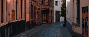 Preview wallpaper street, buildings, paving stones, architecture, flashlight