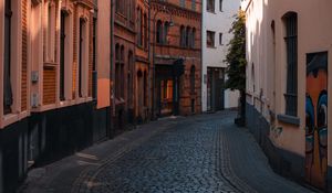 Preview wallpaper street, buildings, paving stones, architecture, flashlight