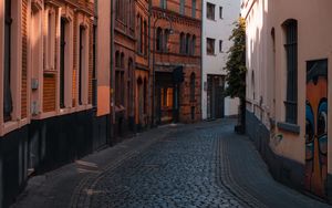 Preview wallpaper street, buildings, paving stones, architecture, flashlight