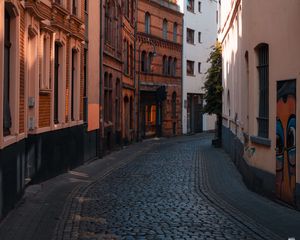 Preview wallpaper street, buildings, paving stones, architecture, flashlight