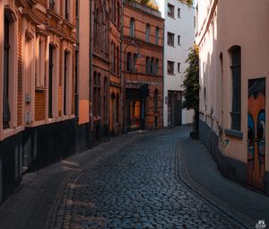 Preview wallpaper street, buildings, paving stones, architecture, flashlight