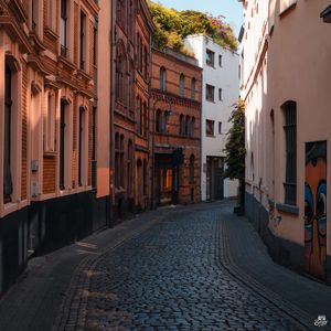 Preview wallpaper street, buildings, paving stones, architecture, flashlight