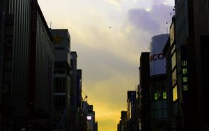 Preview wallpaper street, buildings, people, evening