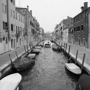 Preview wallpaper street, channel, boats, buildings, black and white