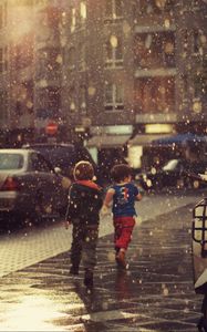 Preview wallpaper street, children, running, rain, city