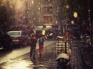 Preview wallpaper street, children, running, rain, city