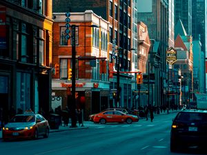 Preview wallpaper street, city, buildings, twilight, movement, road