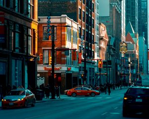 Preview wallpaper street, city, buildings, twilight, movement, road