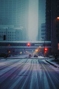 Preview wallpaper street, city, buildings, cars, snow