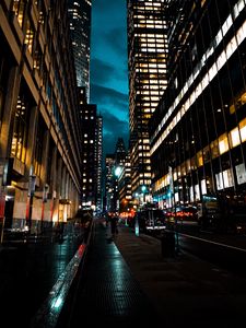 Preview wallpaper street, city, dark, buildings, skyscrapers