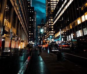 Preview wallpaper street, city, dark, buildings, skyscrapers